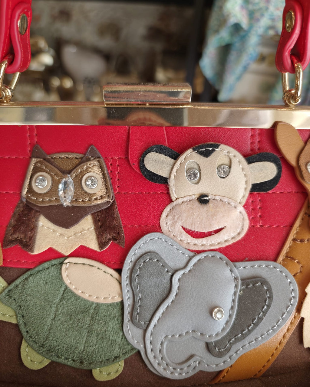 Arca di Noè – Borsa statement con charm animali